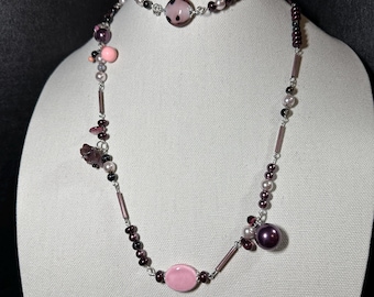 Infiniti Necklace with Estate beads - various mauve, pink and purple tones - 21 inch length