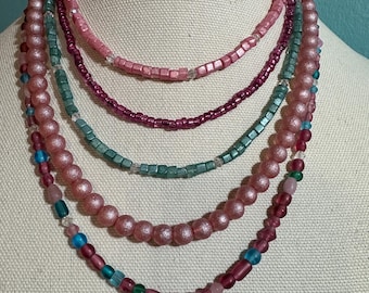 Pink and Blue 5 strand necklae with Estate Cherub removable pendant with matching earrings