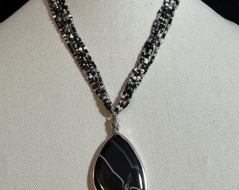 Agate Pendant on 6 strand 16 to 18 inch necklace