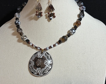 Cocoshell Flower pendant on Rhodonite, Marble, Obsedian necklace with matching earrings