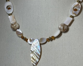 Mother of Pearl Focal 18 to 20 inch necklace with dark golden crystals