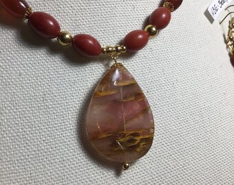 Red Marble with Quartz Pendant