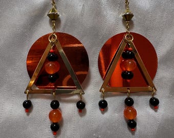 Cats Eye Orange and Black Team Spirit Chandelier Earrings on gold ear wires