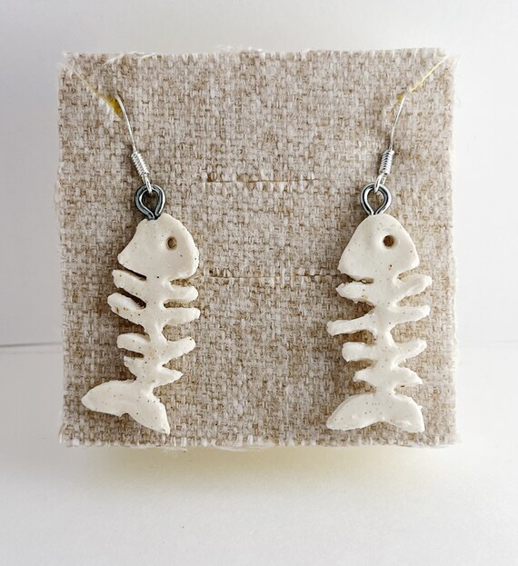 Dangle store skeleton earrings