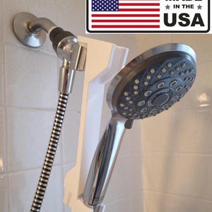 Shower head height adjuster to raise or lower your showerhead in three settings. 3D printed with PETG plastic. No Plumbing. Move 8" up/down.