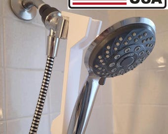 Shower head height adjuster to raise or lower your showerhead in three settings. 3D printed with PETG plastic. No Plumbing. Move 8" up/down.