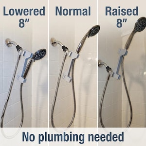 May include: A light gray shower head extension arm shown in three positions: Lowered 8", Normal, and Raised 8". The device attaches to a standard shower pipe and holds a handheld shower head with a flexible metal hose. Text reads No plumbing needed.