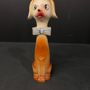 Vintage MCM long neck dog figurine.