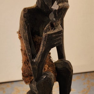 Tribal Thinker Carving