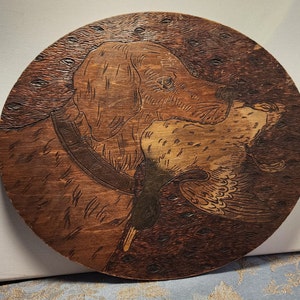 Vintage Folk art Hunting Dog with duck Carving