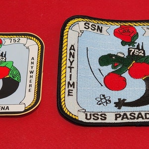 May include: Two embroidered patches featuring a cartoon turtle wearing boxing gloves and a submarine. The patches are navy blue, green, red, and white with the text "SSN 752", "ANYTIME", "ANYWHERE", and "USS PASADENA".
