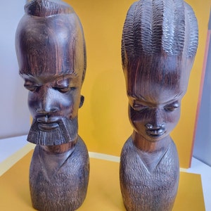 vintage african man and woman carvings
