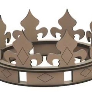 May include: A brown wooden crown with a decorative design. The crown has a circular base and a series of pointed arches.