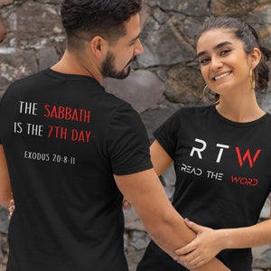 May include: Two people wearing black t-shirts with white text. The person on the left's shirt says "The Sabbath is the 7th Day Exodus 20:8-11". The person on the right's shirt says "RTW Read The Word".