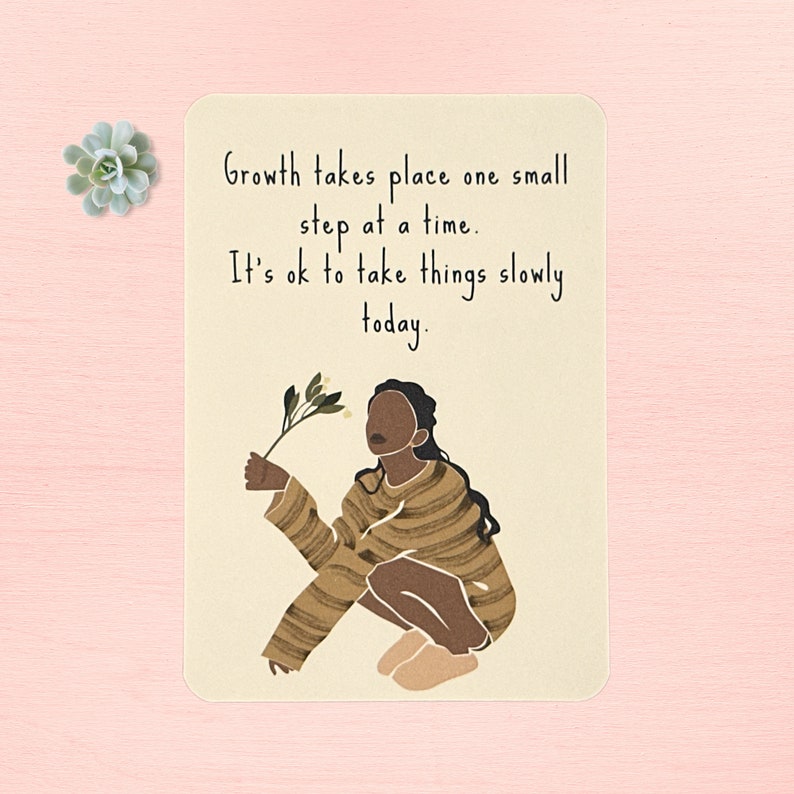 May include: A motivational quote card with a woman holding a flower. The quote reads: "Growth takes place one small step at a time. It's ok to take things slowly today."