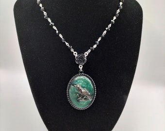 Cameo Necklace Gothic Victorian design with black raven on green background