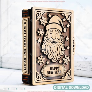 May include: Wooden box with a carved Santa Claus design, snowflakes, and stars. The box has the text "Happy New Year" and "A Gift from the Heart". The box is made of light brown wood.