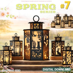 Puede incluir: Una colección de faroles de madera cortados con láser con intrincados diseños temáticos de la naturaleza, que incluyen árboles, pájaros y un gato. Los faroles están iluminados desde el interior, creando un brillo cálido. El texto "SPRING SERIES #7" es visible.