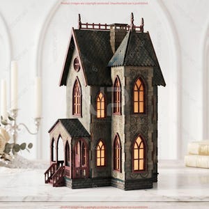 May include: A detailed miniature haunted house with a dark gray roof, arched windows, and a small porch. The house has a stone-like texture with red trim and illuminated windows, creating a spooky ambiance. The house is a decorative item.