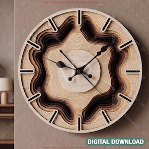 May include: A circular wall clock featuring a layered, topographical design made of wood in varying shades of light, medium, and dark brown. The clock face has a central light wood circle with black hands and black rectangular hour markers along the edge.