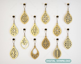 May include: A collection of ten gold-colored, laser-cut teardrop earrings with various openwork designs. Each earring hangs from a small hook. The earrings are displayed against a white background. The words "DIGITAL DOWNLOAD" are at the bottom.