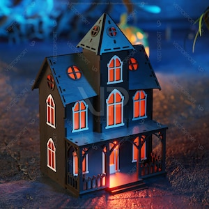 May include: A black wooden haunted house with glowing orange windows. The house is decorated with a porch and railings. The house is sitting on a dark surface.
