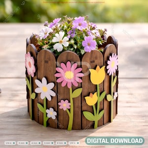 May include: A wooden planter with a picket fence design, adorned with colorful flower cutouts. The planter is filled with vibrant purple and white flowers. The words "DIGITAL DOWNLOAD" are at the bottom.