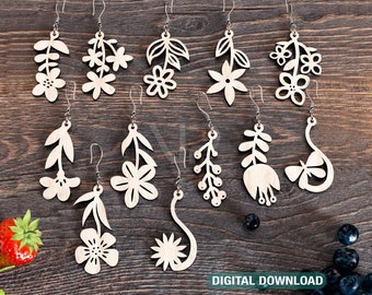 Puede incluir: Conjunto de 10 pendientes de madera cortados con láser con diseños florales y botánicos. Los pendientes son de varias formas y tamaños, con detalles intrincados y líneas delicadas.
