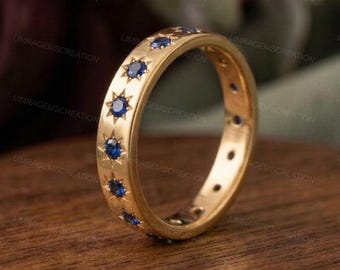 14k Gold Sapphire Starburst Ring • Celestial Blue Sapphire Wedding Band • Star Engraved Eternity Ring • September Birthstone Gift for Her .