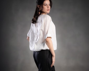 Witte katoenen boerenblouse: boho-striktopje