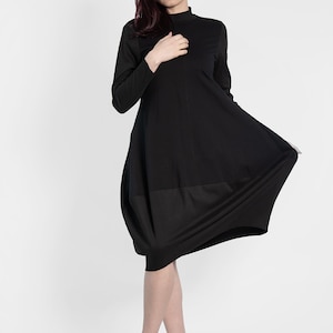 Woman bell black dress