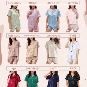 May include: Twelve different color satin pajama sets. The sets include a short-sleeved top and shorts. The colors are sage green, mauve, grey blue, light pink, rose gold, champagne gold, champagne, white, red, dark green, navy, and black.