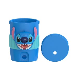 May include: A bright blue cylindrical tumbler featuring a raised, molded character face of Stitch with large ears, a dark nose, and white teeth. The cup includes a light blue textured band around the middle and a separate matching blue lid with a hole.