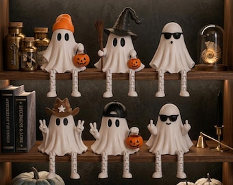 May include: Six white ghost figurines with dangling legs, arranged on two wooden shelves. The ghosts wear various accessories including an orange beanie, a black witch hat, sunglasses, a brown cowboy hat, and a black baseball cap, holding pumpkins.