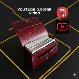 May include: A deep red leather card holder with a snap button closure, containing a stack of white cards. The image includes text reading YouTube tutorial video, a red PDF download icon, and a red neon-style YouTube play button icon.