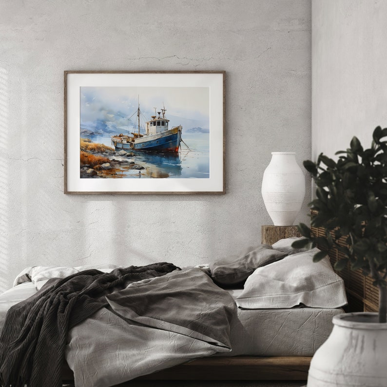 May include: A watercolour painting depicting a blue and white fishing boat moored in a tranquil bay. The boat is surrounded by water and a rocky shoreline. The sky is a soft grey with hints of blue.