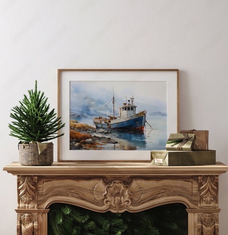 May include: A framed watercolour painting of a blue and white fishing boat moored in a harbour. The boat is surrounded by water and rocks. The painting is set against a white wall with a small green pine tree in a wicker basket on a wooden mantelpiece.