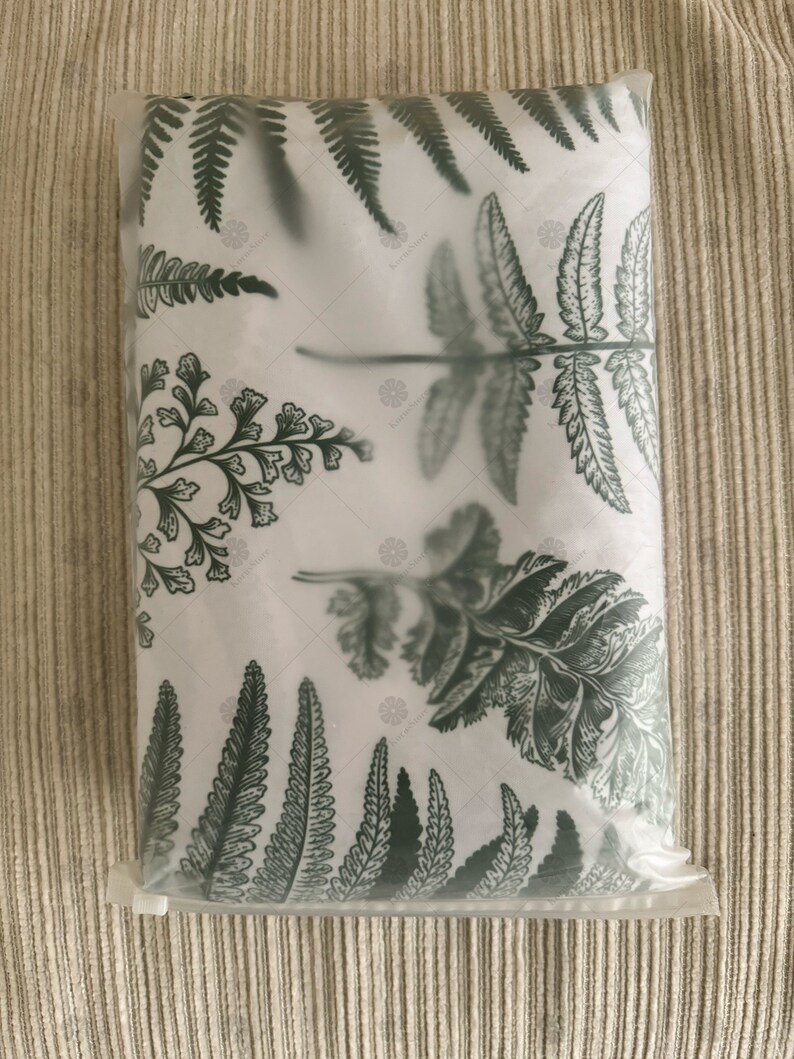 May include: A white pillowcase with a green fern pattern. The pillowcase is packaged in a clear plastic bag.