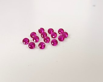 7mm Lab Created Ruby: Round Faceted Synthetic Gemstone