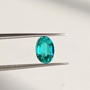 Rare Blue Apatite Gemstone: Eye Clean Oval Faceted Cut Stone (4.90x7.15 mm)
