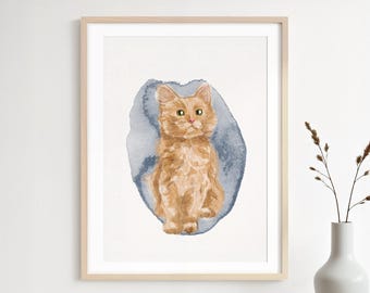 May include: Watercolor painting of a ginger cat with green eyes, centered on a blue-grey abstract shape. The cat is depicted in a seated position, with detailed fur and a focused gaze. The artwork is framed in a light wood frame.