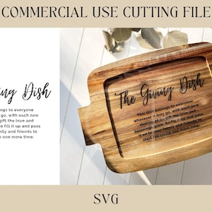 May include: Wooden serving dish with the text "The Giving Dish" and a message about sharing love and blessings. The dish has a square shape with rounded corners and handles. The image also includes the text "COMMERCIAL USE CUTTING FILE" and "SVG".