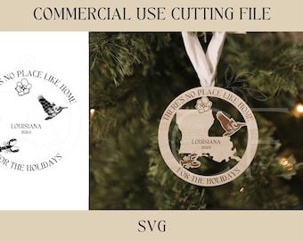 May include: A wooden ornament shaped like a circle with the text "There's no place like home for the holidays" and a silhouette of the state of Louisiana with the text "Louisiana 2024".