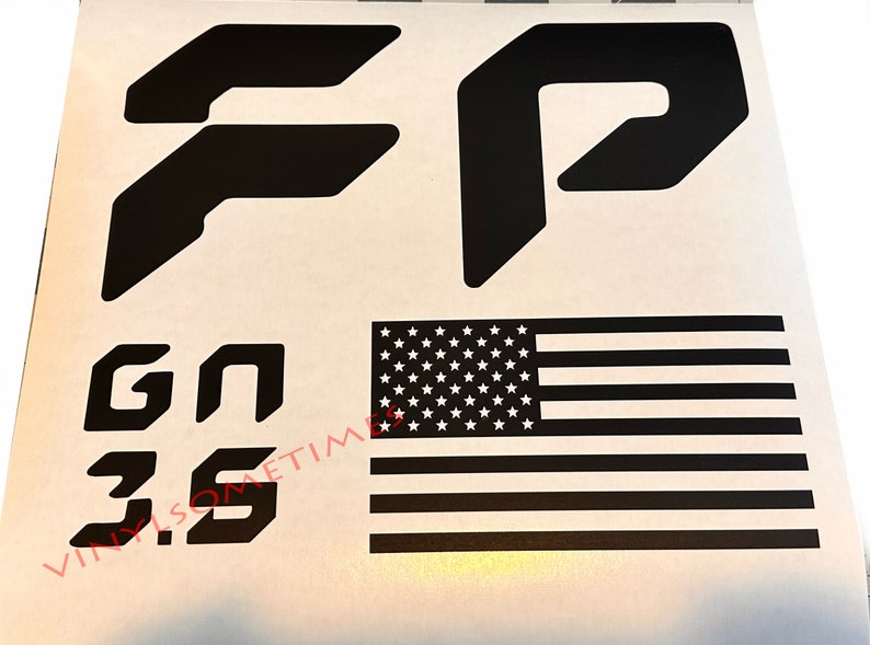 May include: Black vinyl decals featuring the letters "F", "P", "GN", and "3.5", along with a black and white American flag.