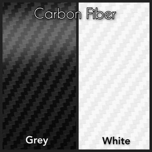 May include: Two samples of carbon fiber fabric, one in grey and one in white. The fabric has a woven pattern.