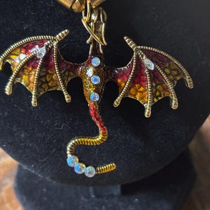 Jeweled enamel crimson and gold dragon necklace.  145
