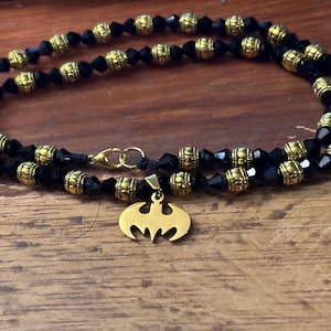 Black and gold bat sigil necklace