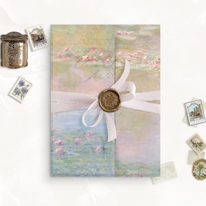 May include: A watercolor-style invitation card with a light blue, green, and pink background. The card features a floral design with a white ribbon and a gold wax seal. The card is folded in half and has a blank space for writing.