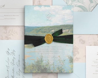 May include: A wedding invitation suite featuring a central card with a landscape painting of a river valley, tied with a dark green ribbon and a gold wax seal. The suite includes light blue envelopes with floral liners and white response cards.