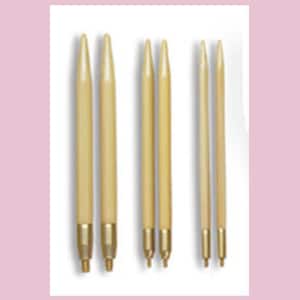 May include: Set of six wooden knitting needles in various sizes. The needles are beige with gold-colored tips.